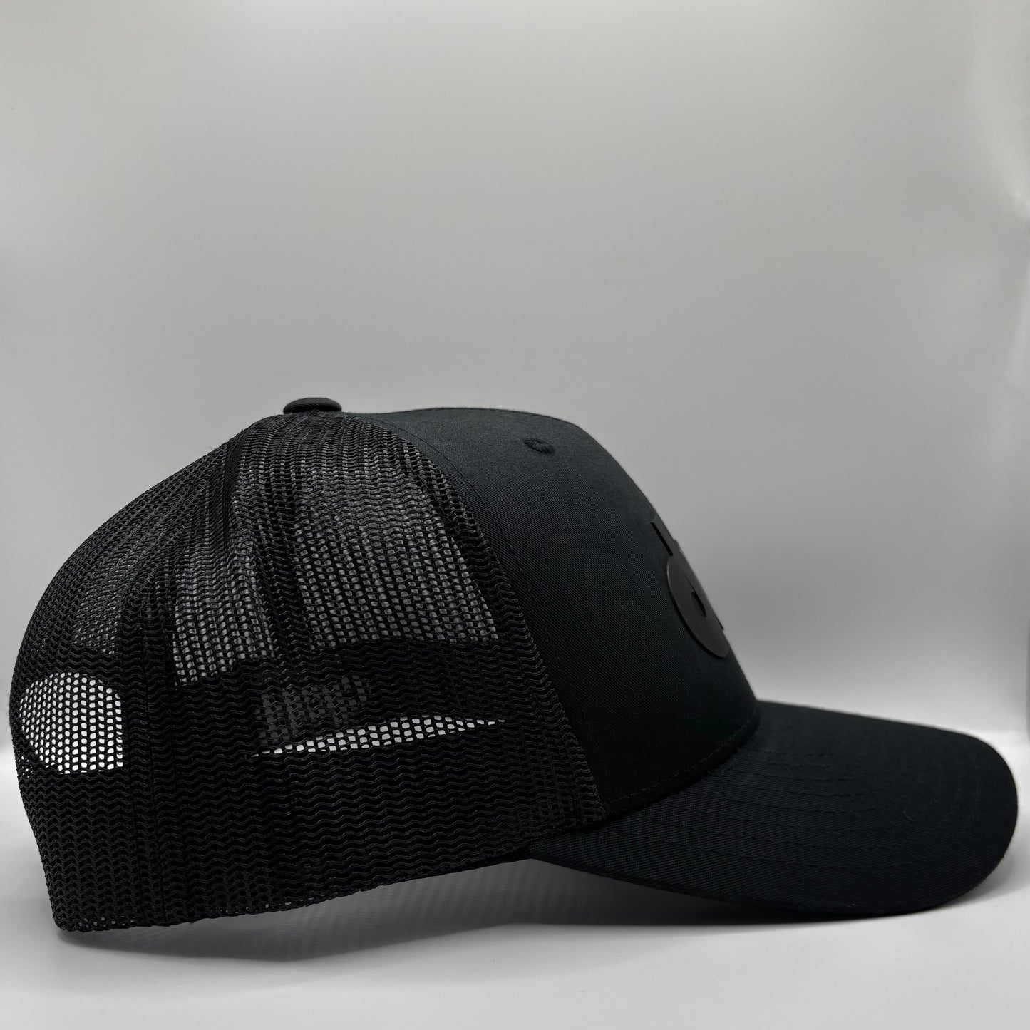BLACK ON BLACK TRUCKER
