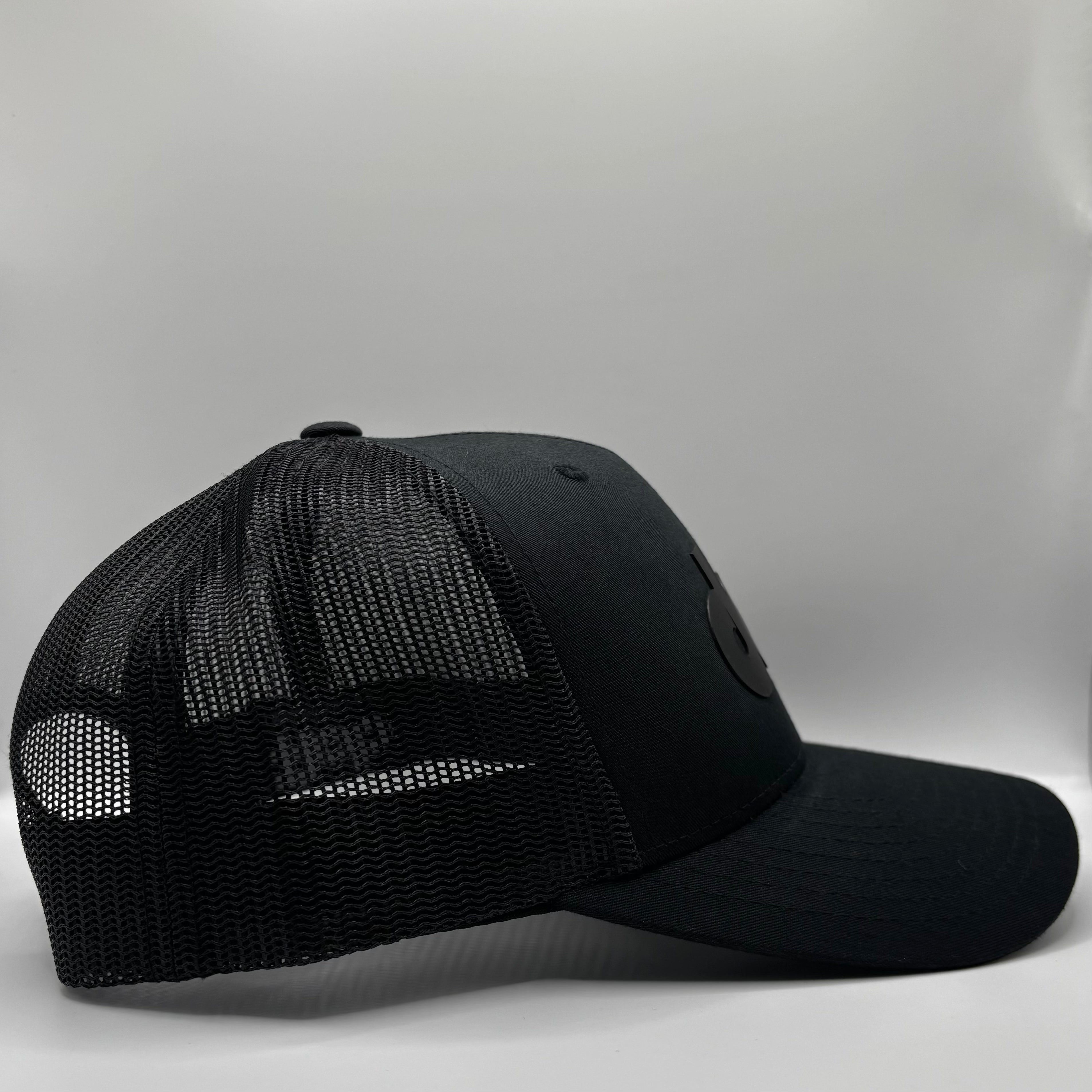 BLACK ON BLACK TRUCKER