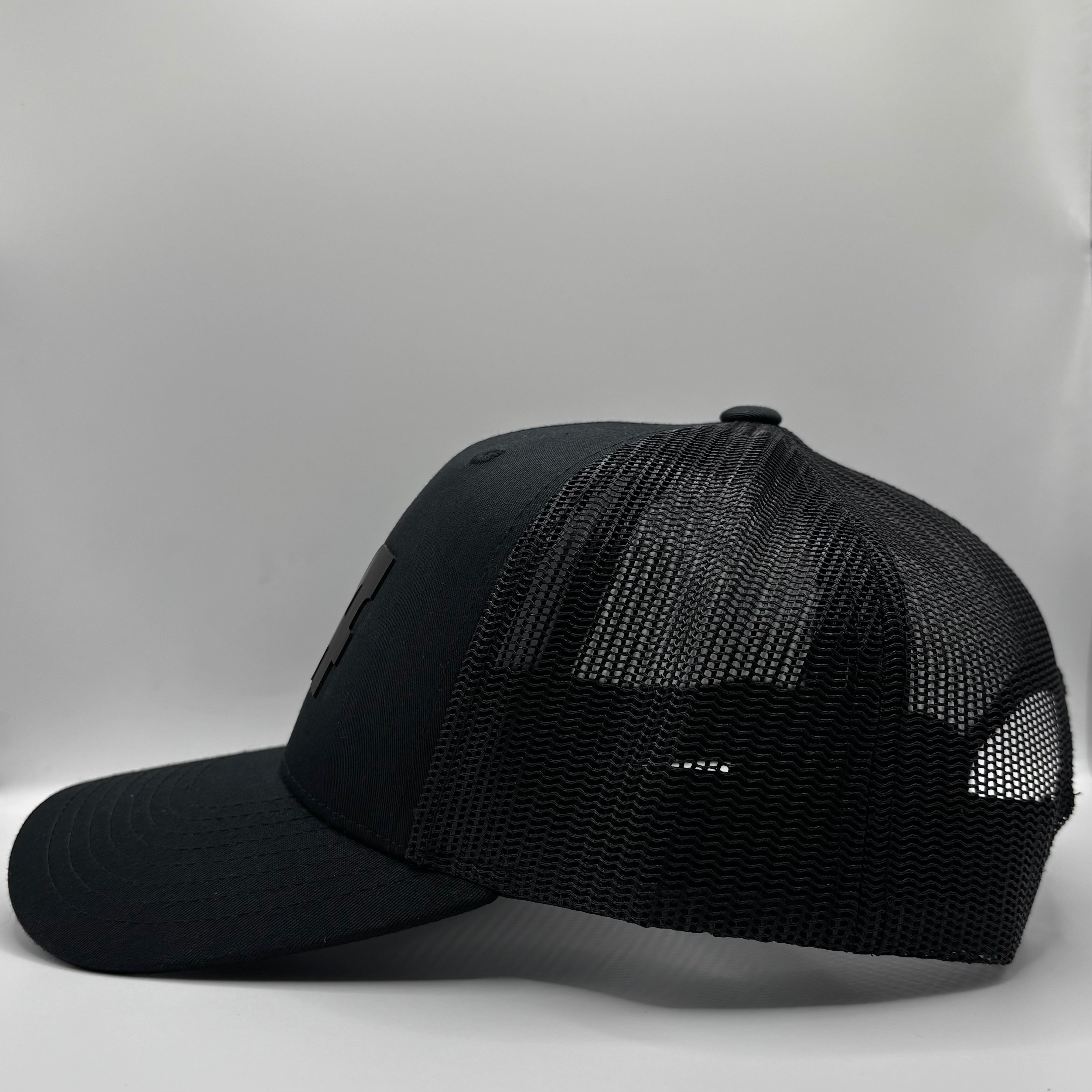 BLACK ON BLACK TRUCKER